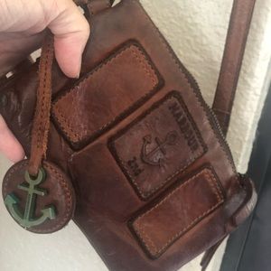Harbor 2nd convertible crossbody brown leather bag. Front magnet pocket.